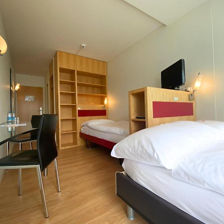 Hotel Seaside Spiez Bagian luar foto