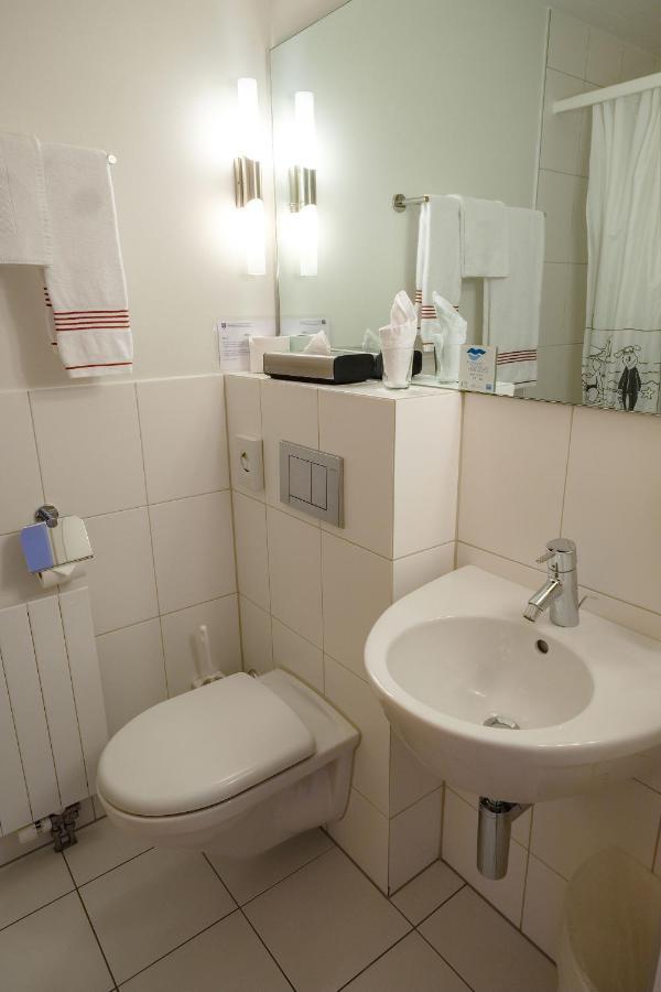 Hotel Seaside Spiez Bagian luar foto