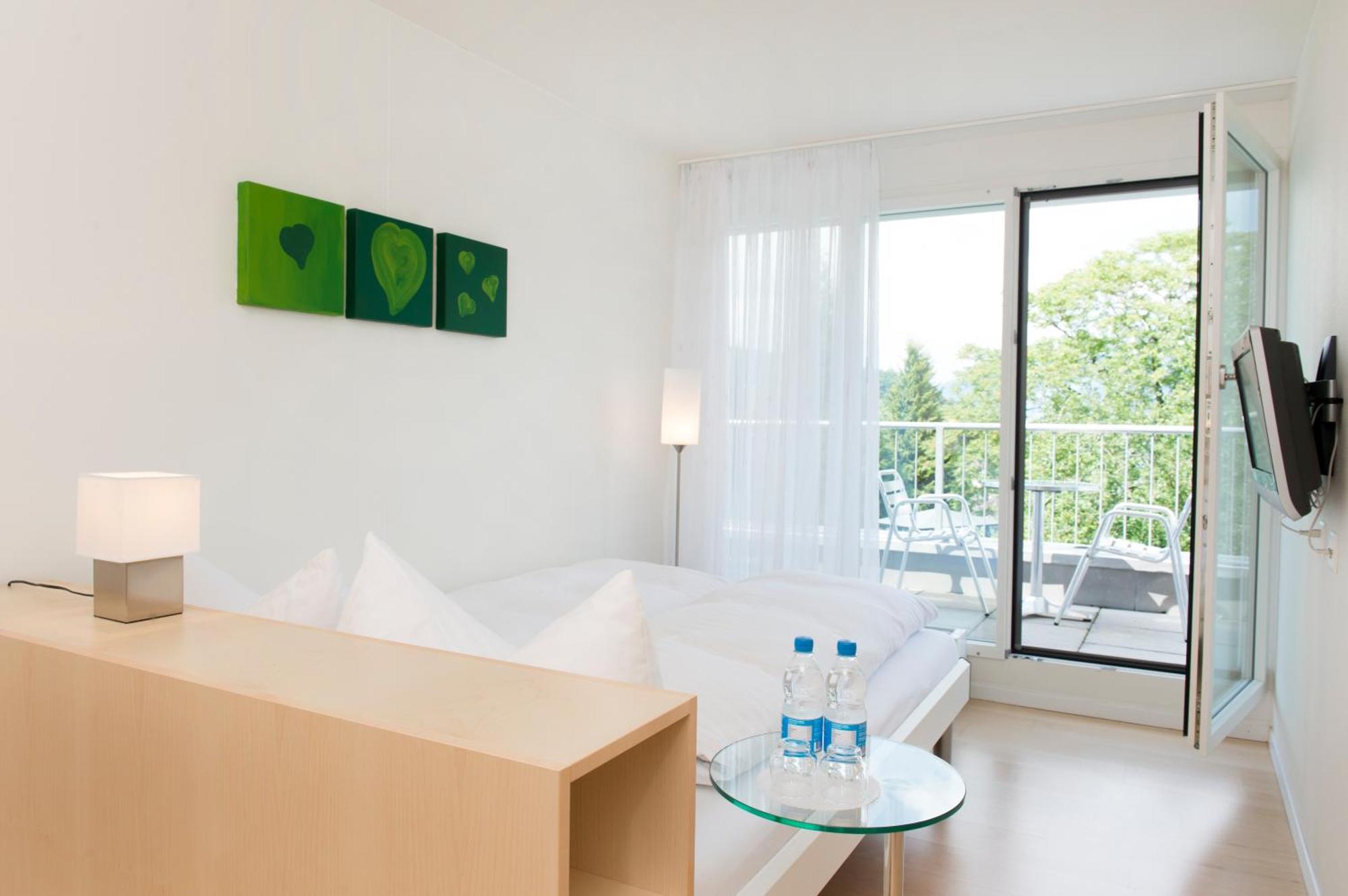 Hotel Seaside Spiez Bagian luar foto