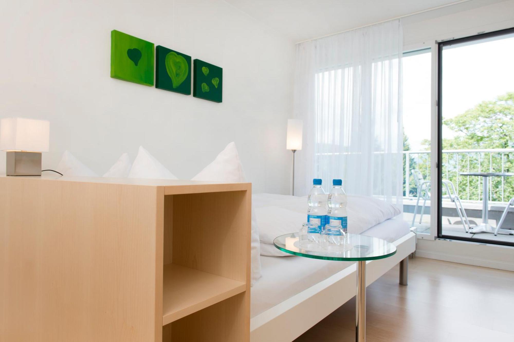 Hotel Seaside Spiez Ruang foto
