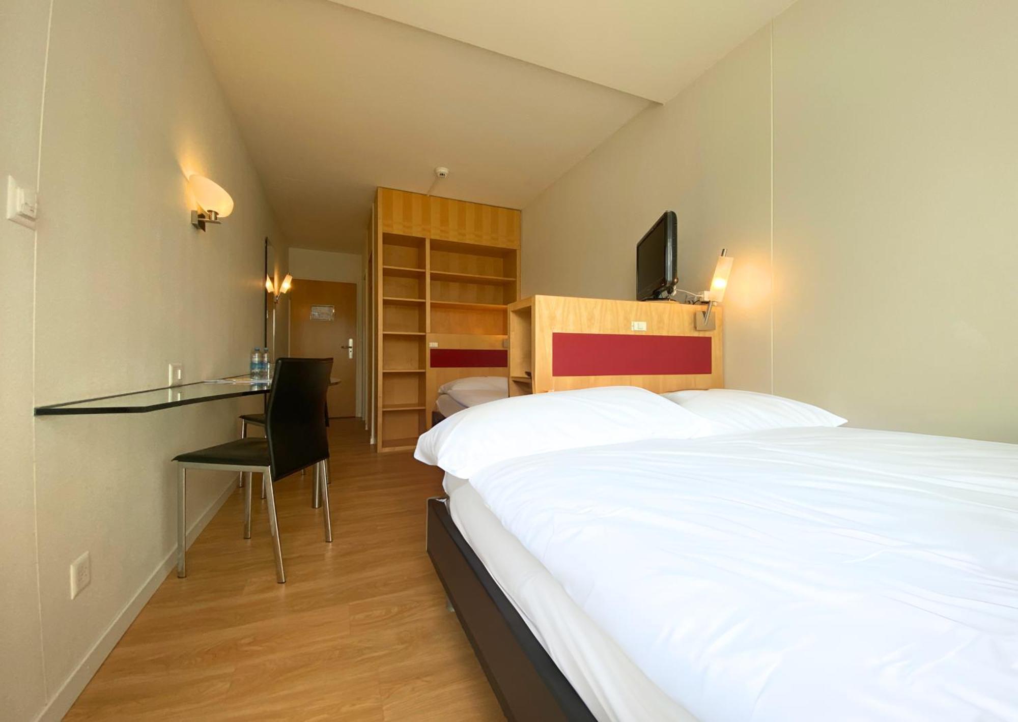 Hotel Seaside Spiez Bagian luar foto
