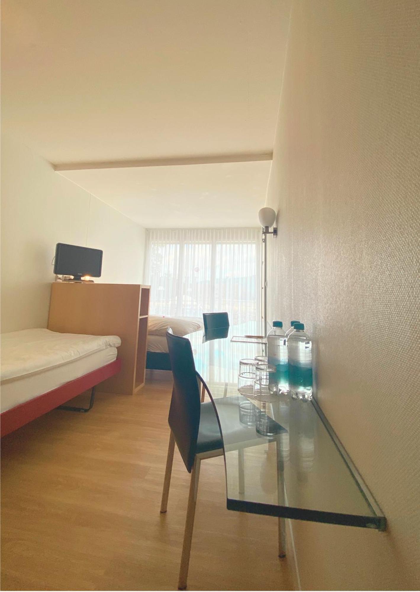 Hotel Seaside Spiez Bagian luar foto