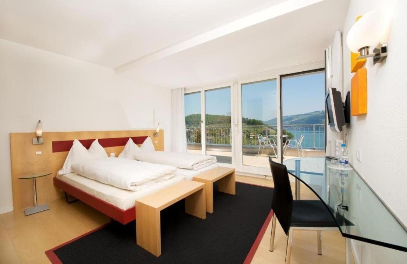 Hotel Seaside Spiez Bagian luar foto