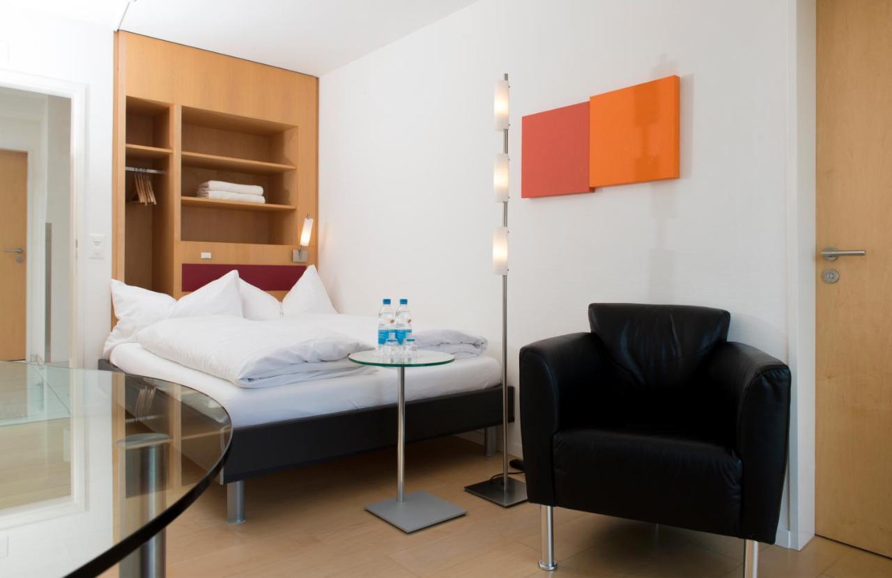 Hotel Seaside Spiez Bagian luar foto